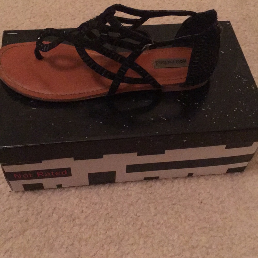 Gently used black sandals